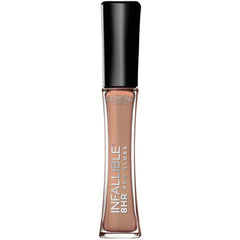 L’Oréal Paris Infallible 8HR Lip Gloss Coral Sands swatch on pout with rich color.
