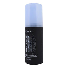 L'Oreal Paris Infallible Pro-Spray Set demonstrates 8-10 inch distance for even mist