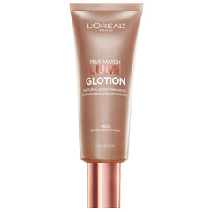 L'Oreal Paris Lumi Glotion face application closeup highlighting a natural glow.