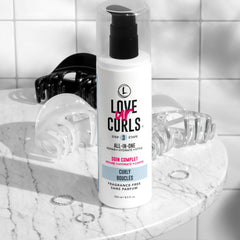 Love Ur Curls Shea Butter visual emphasizes nourishing repair for curls