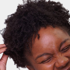 Portrait of defined kinky-coily curls using Love Ur Curls cream