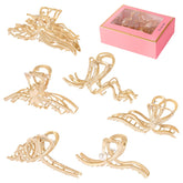LUKACY large metal hair claw clip close-up in gold for secure hold on thick hair.