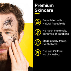 Lumin Charcoal Scrub Deep Detox applied to forearm for gentle exfoliation