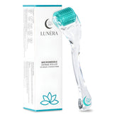 Lunèra derma roller face close-up with 192 titanium needles for smoother skin prep.