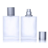Luojery 100ml frosted glass bottle with silver cap for travel-friendly fragrance.