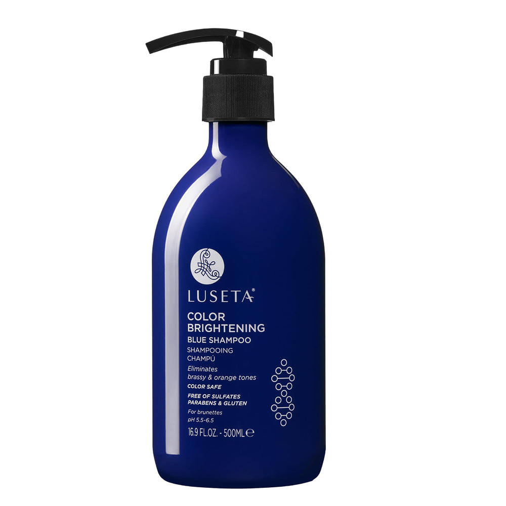 Luseta Color Brightening Blue Shampoo bottle for brunettes on sink, neutralizing brass tones.