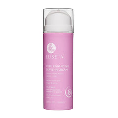 Luseta Curl Defining Cream bottle highlights defined curls and hydration.