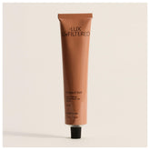 Lux Unfiltered N°24 hand cream jar close-up showing rich hydration for dry hands.