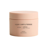 Lux Unfiltered N°28 exfoliating body polish bottle with Santal scent for spa-like exfoliation.
