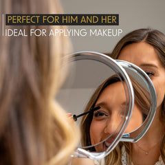 Luxo shower mirror includes removable razor holder for convenient grooming.