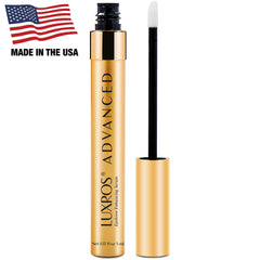 LUXROS eyebrow serum applicator brush ready for nightly application to support growth.