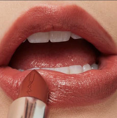MAC Ximal Sleek Satin Lipstick close-up application displays color payoff and 8-hour wear.