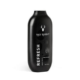 Mad Rabbit Refresh Body Wash bottle closeup highlighting hydrating formula for all skin types.