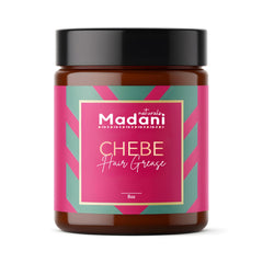 Madani Naturals Chebe Hair Grease jar closeup — creamy texture supports scalp nourishment.