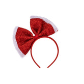 Madison Tyler oversized Christmas bow headband in red glitter adds festive party flair.