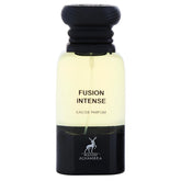 Maison Alhambra Fusion Intense bottle pouring reveals lasting aroma for daily wear.