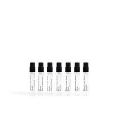 Maison Louis Marie discovery set mini sprays arranged for travel-friendly testing.