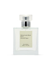 Maison Louis Marie No.13 Nouvelle Vague bottle closeup shows radiant scent and premium presentation.