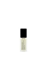 Maison Louis Marie No.04 Bois de Balincourt roll-on bottle closeup for intimate, long-lasting fragrance.