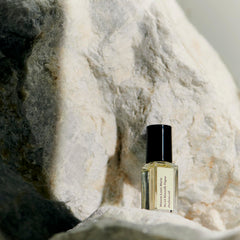 Maison Louis Marie No.13 application to pulse points demonstrates intimate scent release.