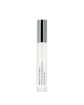 Maison Louis Marie No.04 Bois de Balincourt travel spray bottle closeup, highlighting warm wood notes for on-the-go.