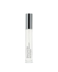 Maison Louis Marie No.04 Bois de Balincourt travel spray bottle closeup, highlighting warm wood notes for on-the-go.
