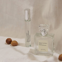 Maison Louis Marie No.04 Bois de Balincourt travel spray at pulse point use, projecting subtle warmth.