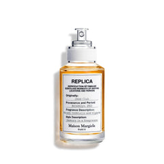 Maison Margiela Jazz Club bottle closeup showing vanilla and tobacco warmth for date nights