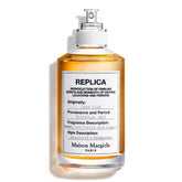 Maison Margiela Replica Jazz Club bottle on display for evening wear and warm ambience.