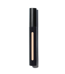 MAKE Beauty Skin Mimetic Concealer on the cheek blends seamlessly for a radiant finish