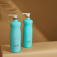 Malibu C texture closeup reveals creamy formula enriching damaged strands.