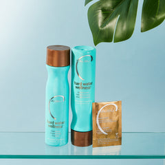 Malibu C Hard Water Wellness Shampoo in-lather shot demonstrates cleansing action.