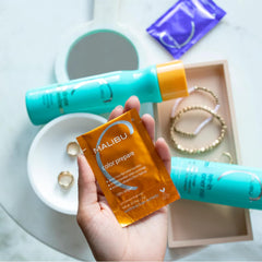 Malibu C Hydrate packaging close up highlighting vegan and sulfate free benefits