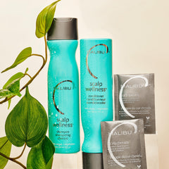 Malibu C Scalp Wellness Conditioner bottle pump delivering nourishing moisture for dry scalp.