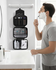 Maliton toiletry bag hanging setup shows convenient, hands-free access during hotel stays.