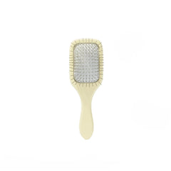 Mane Ready or Knot Mini Detangler Brush handle close-up, ergonomic birch wood grip for easy detangling.