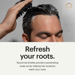 MANSCAPED Scalp Buffer hanging notch shown for quick drying and storage.