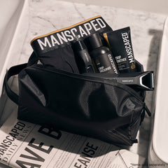MANSCAPED The Shed 2.0 ripstop nylon texture highlights durable, travel-ready fabric.