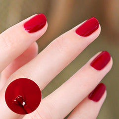 Manucurist Green Red Cherry cap and bottle reveal vegan, eco-friendly polish.