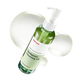 MANYO Herb Green Cleansing Oil bottle close-up showing gentle plant-based cleansing for all skin types