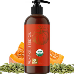 Maple Holistics Pumpkin Seed Oil bottle pour for hair hydration.