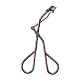 MAQuillAGE Shiseido Edge Free Eyelash Curler close-up shows precise edge-free curling for natural definition.