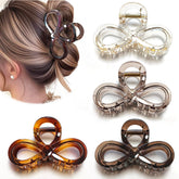 Markuii 3.9-inch glossy hair claw clip held in hand for secure daily styling