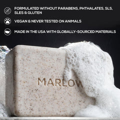 MARLOWE No.102 Oud Wood bar closeup emphasizes earthy aroma and scrub action.
