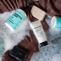 Marlowe No.106 Charcoal Cleanser bottle with slate background suggesting deep cleansing.