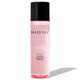 Mary Kay Oil-Free Eye Makeup Remover bottle close-up highlights dual-phase formula for sensitive eyes.