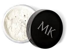 Mary Kay translucent loose powder jar close-up for natural matte finish and shine control.