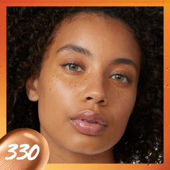 Maybelline Super Stay Skin Tint swatches on arm for natural radiance and even tone.