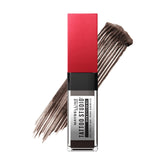 Maybelline Tattoo Studio Brow Styling Gel tube swatch showing rich pigment and natural color.