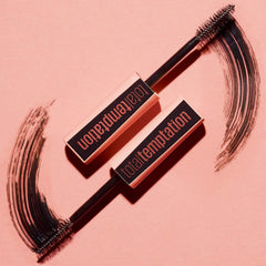 Maybelline Total Temptation mascara applied lashes showing soft, fluffy fullness